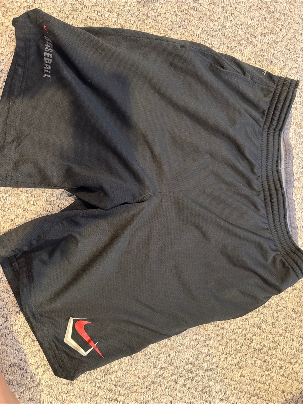 Nike Black Athletic Shorts with Red Swoosh